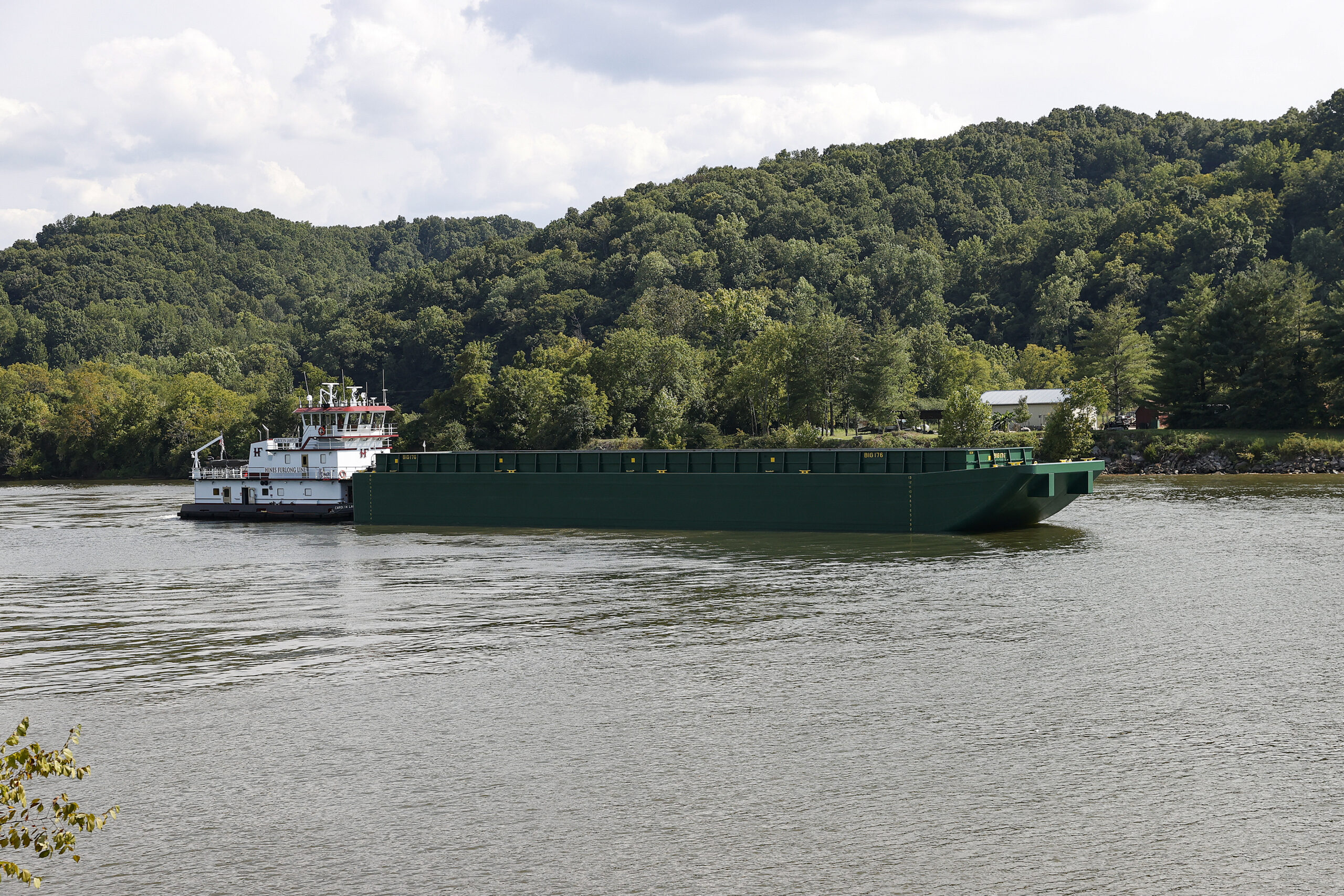 A NABRICO hopper barge under tow